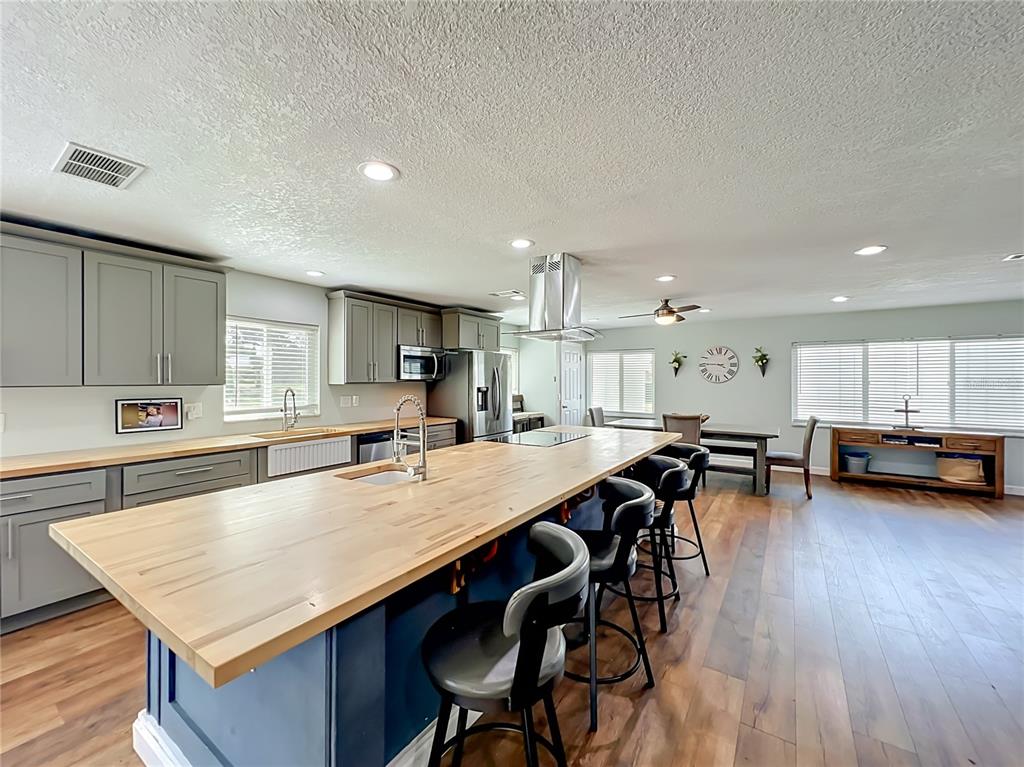 153 Variety Tree Circle Altamonte Springs, FL 32714 - Photo 13 of 44 a large kitchen with a table and chairs