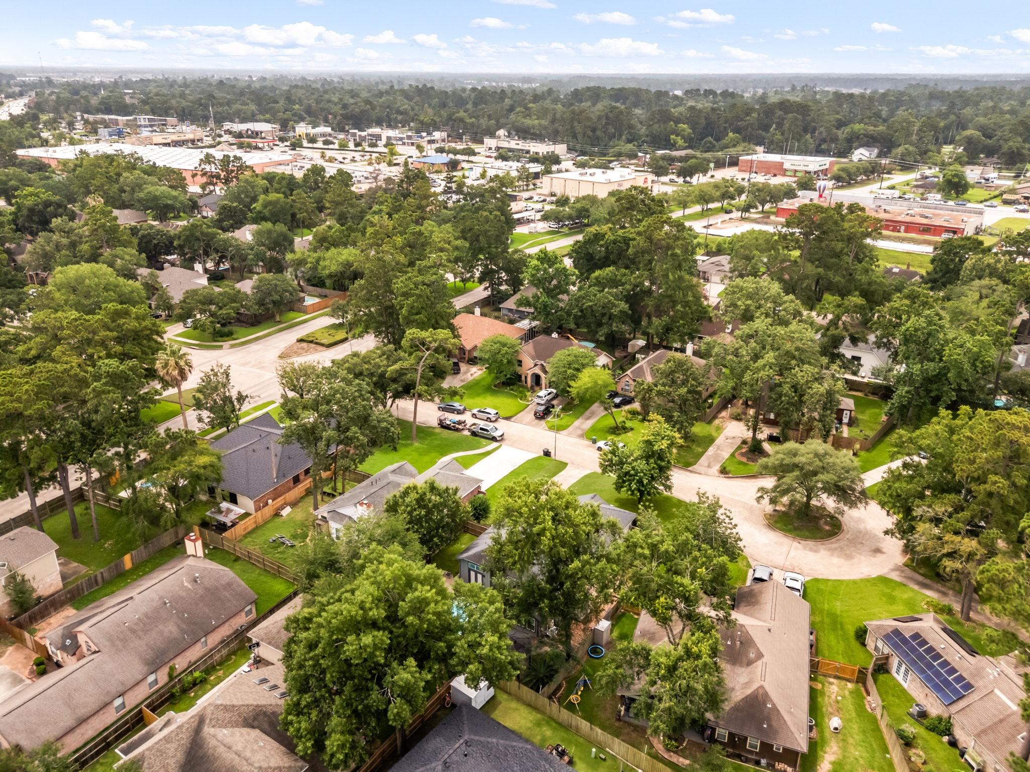 1915 Mercoal Drive Spring, TX 77386 - Photo 47 of 50 Elevated neighborhood view showcasing nearby homes and mature tree-lined streets.