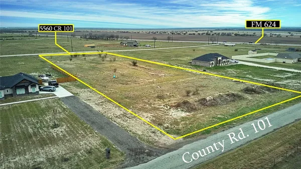 a view of a pool with a patio