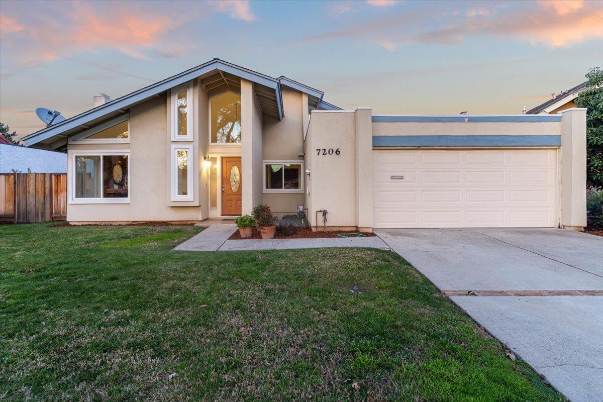 a front view of house with yard