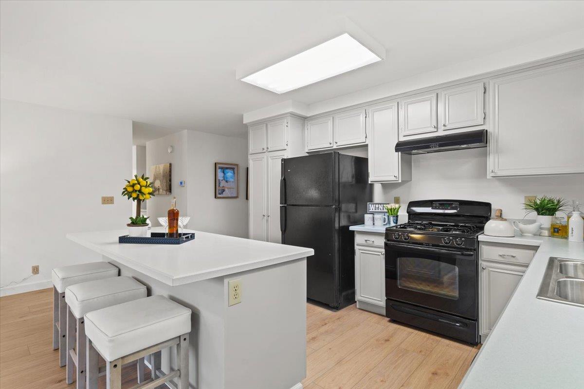 7206 Vía Lomas San Jose, CA 95139 - Photo 11 of 37 a kitchen with a sink appliances and cabinets