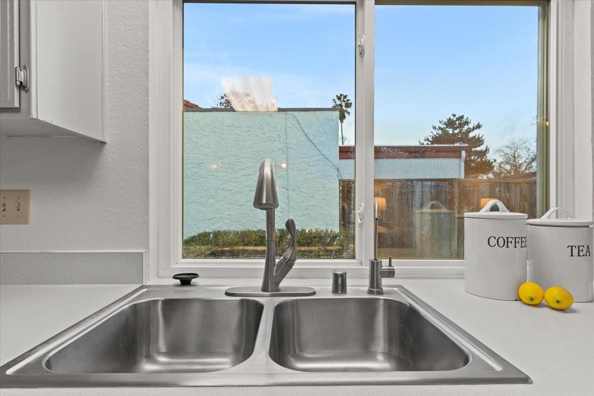 7206 Vía Lomas San Jose, CA 95139 - Photo 14 of 37 a kitchen sink with a granite countertop window