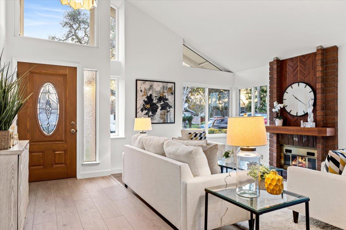 7206 Vía Lomas San Jose, CA 95139 - Photo 2 of 37 a living room with furniture a rug a clock and a window