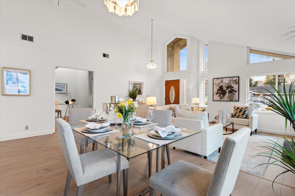 7206 Vía Lomas San Jose, CA 95139 - Photo 9 of 37 a view of a dining room with furniture and a potted plant