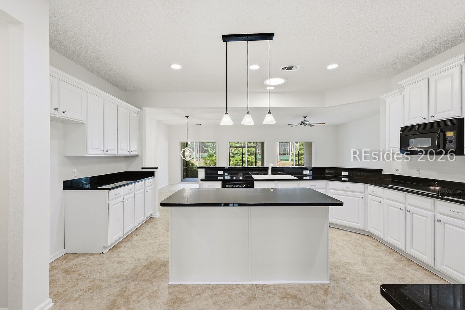 108 Landing Lane Bluffton, SC 29909 - Photo 13 of 63 View from kitchen to living area and lanai