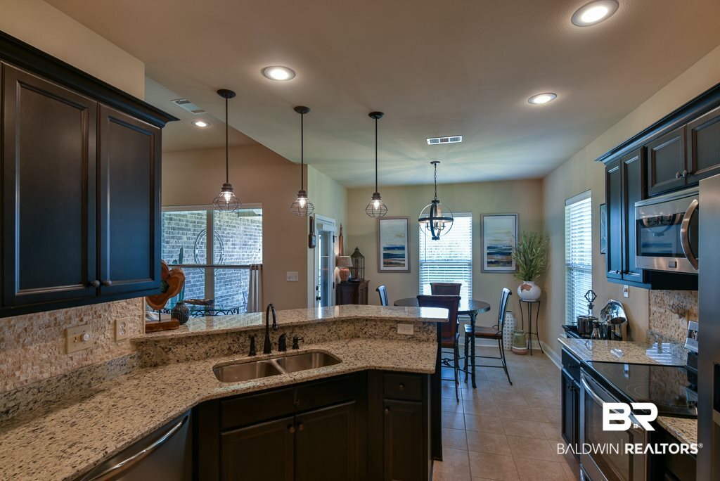 1145 Crown Walk Drive Foley, AL 36535 - Photo 10 of 32 BEAUTIFUL GRANITE COUNTERS AND AMPLE CABINET SPACE