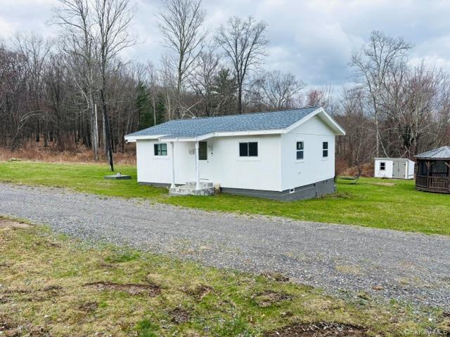 280 Hall Hill Road Ancram, NY 12502 - Photo 2 of 19 a view of backyard of house with green space