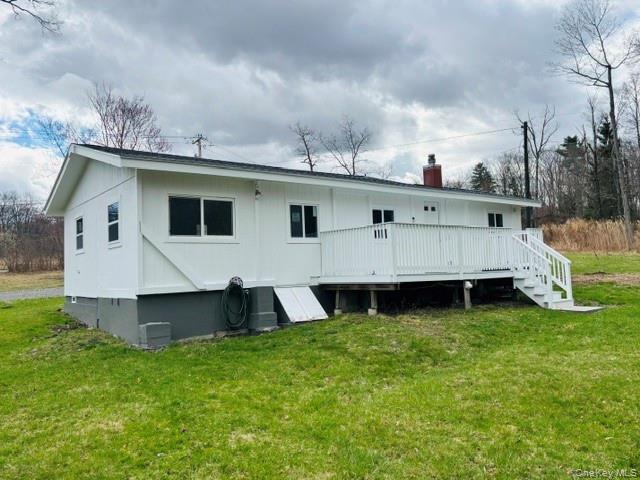 280 Hall Hill Road Ancram, NY 12502 - Photo 8 of 19 a view of a house with a backyard