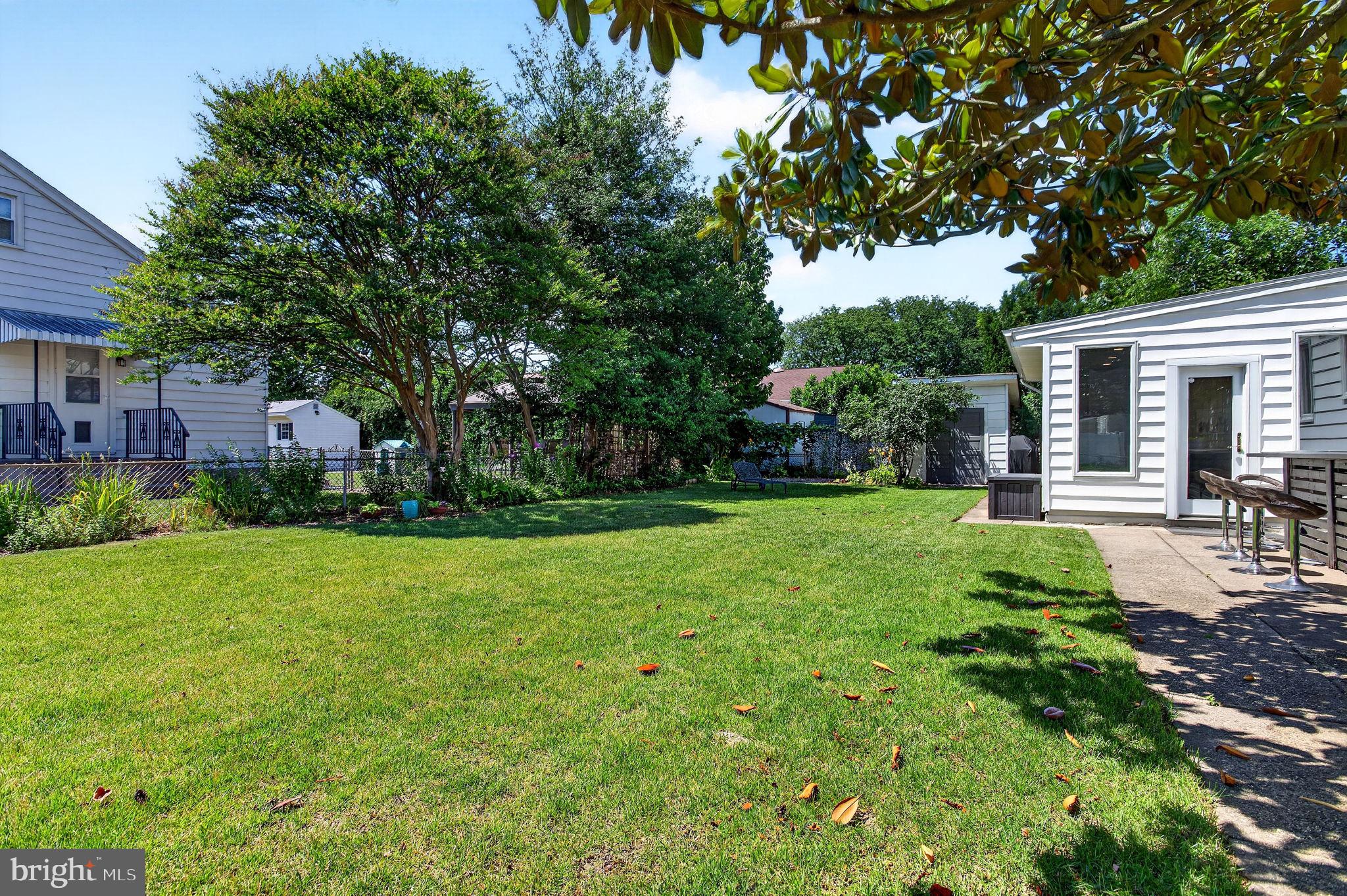 321 Buttonwood Street Hamilton, NJ 08619 - Photo 36 of 42 Expansive lawn area with mature landscaping