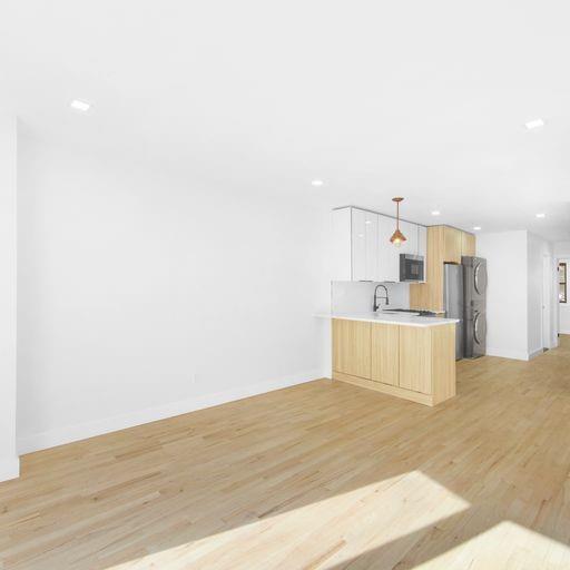 87 Adelphi Street Brooklyn, NY 11205 - Photo 14 of 35 a view of kitchen with wooden floor