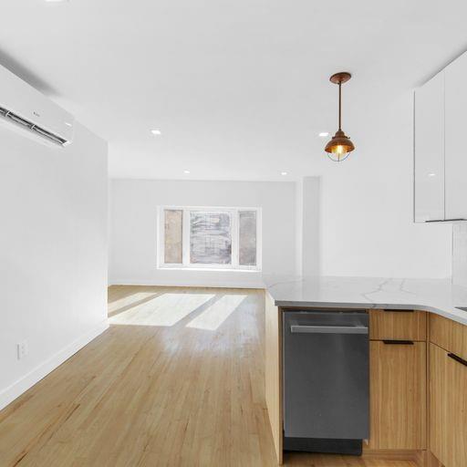 87 Adelphi Street Brooklyn, NY 11205 - Photo 16 of 35 a view of an entryway with wooden floor