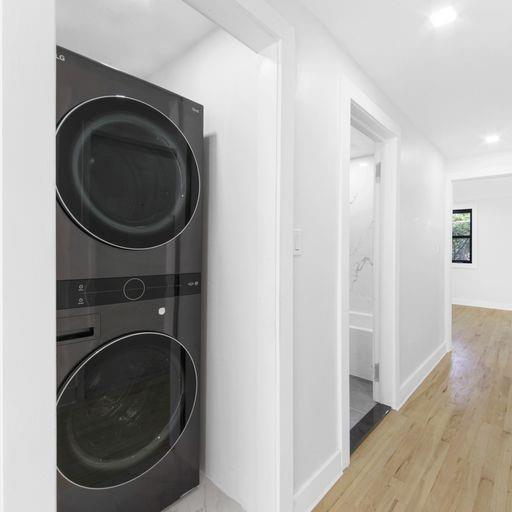 87 Adelphi Street Brooklyn, NY 11205 - Photo 28 of 35 a utility room with dryer and washer