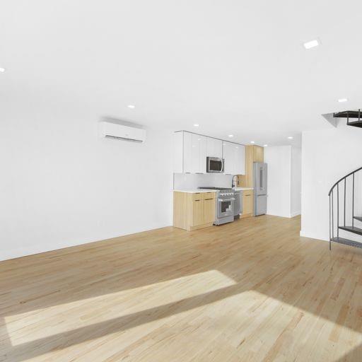 87 Adelphi Street Brooklyn, NY 11205 - Photo 31 of 35 a view of a kitchen with a sink