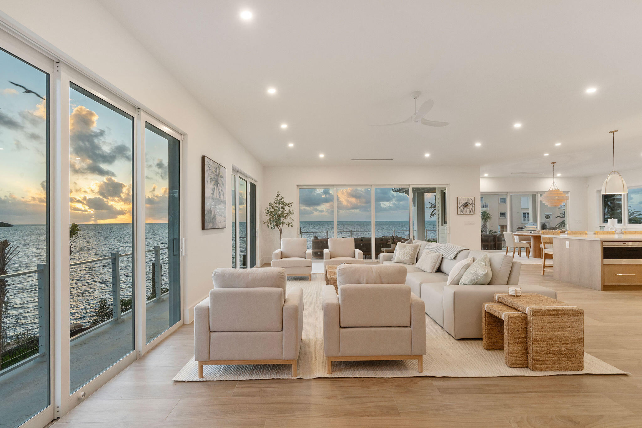 1002 Snapper Lane Key Largo, FL 33037 - Photo 11 of 106 a living room with furniture large windows and wooden floor