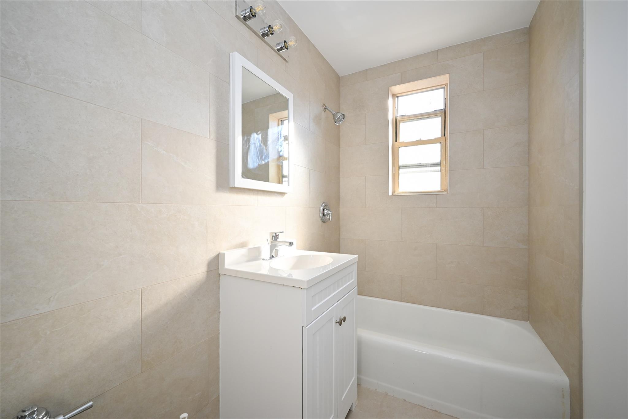 6535 Broadway, Unit 6A Bronx, NY 10471 - Photo 14 of 26 Remodeled bathroom