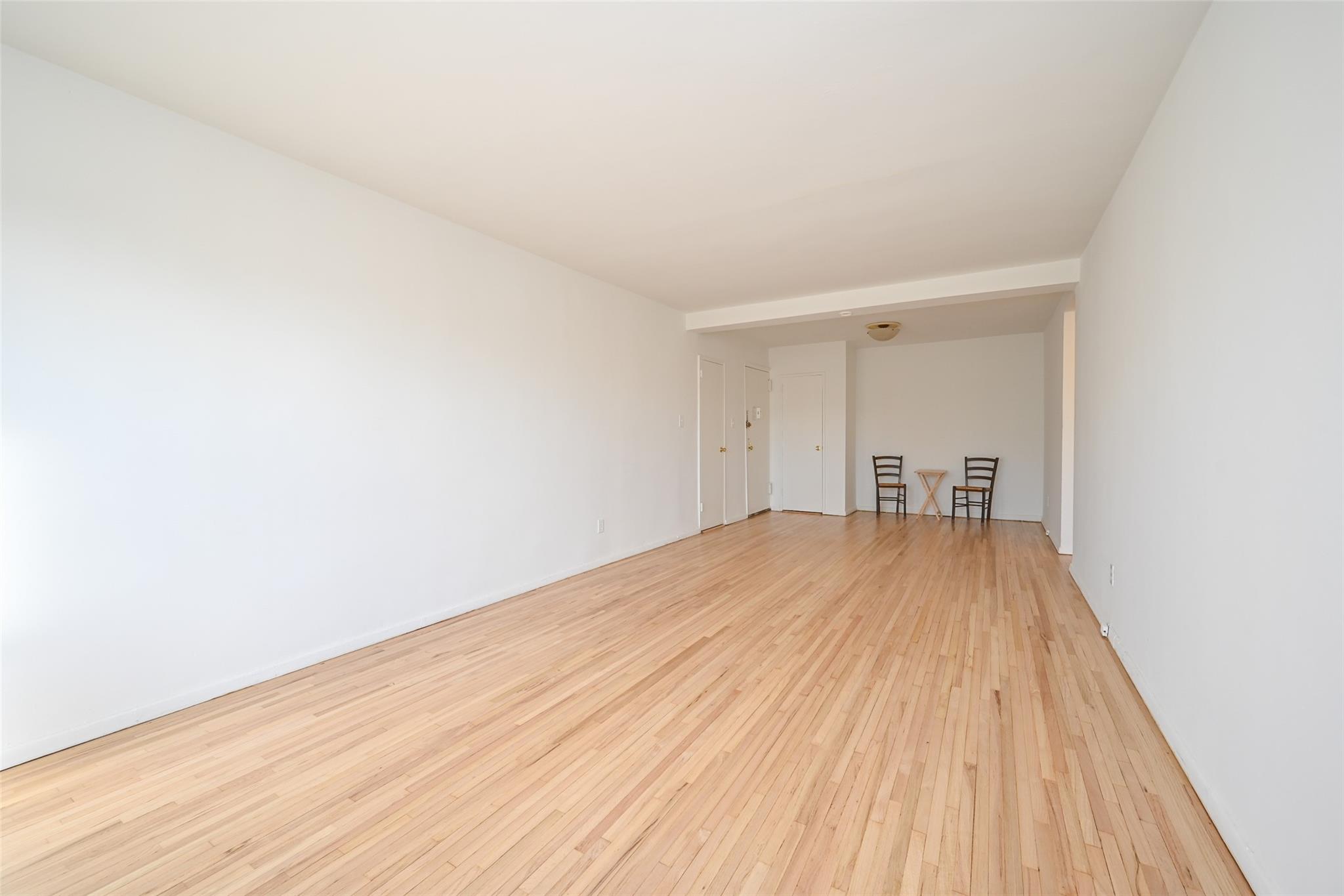 6535 Broadway, Unit 6A Bronx, NY 10471 - Photo 8 of 26 Spacious living room with versatile dining nook