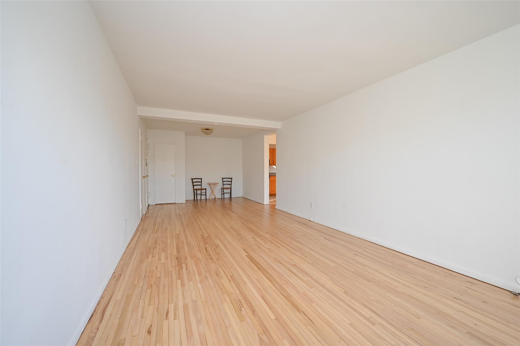 6535 Broadway, Unit 6A Bronx, NY 10471 - Photo 9 of 26 Spacious living room with versatile dining nook