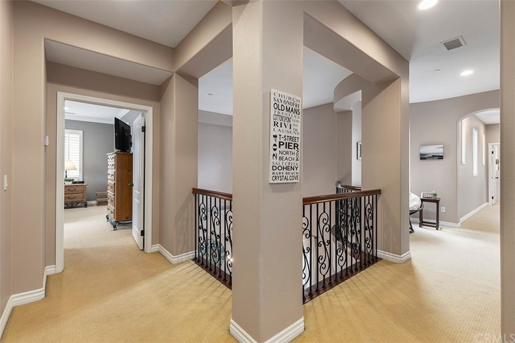 517 Via El Risco San Clemente, CA 92673 - Photo 27 of 51 a view of a hallway with a livingroom and a dinning area