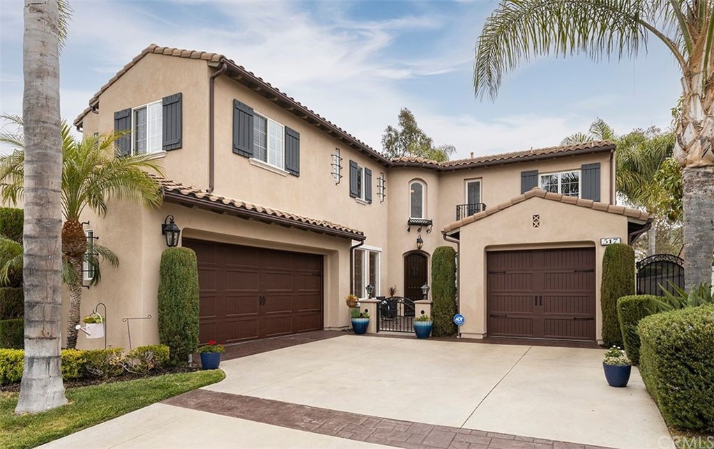 517 Via El Risco San Clemente, CA 92673 - Photo 3 of 51 a front view of a house with a garden and garage