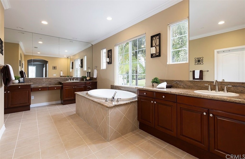 517 Via El Risco San Clemente, CA 92673 - Photo 34 of 51 a large kitchen with stainless steel appliances granite countertop a large counter top a sink and a refrigerator