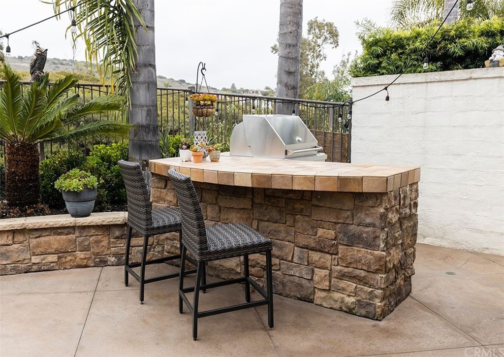 517 Via El Risco San Clemente, CA 92673 - Photo 37 of 51 a view of balcony with outdoor seating and plants