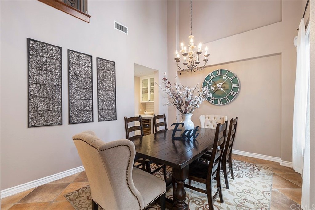 517 Via El Risco San Clemente, CA 92673 - Photo 7 of 51 a view of a dining room with furniture and chandelier