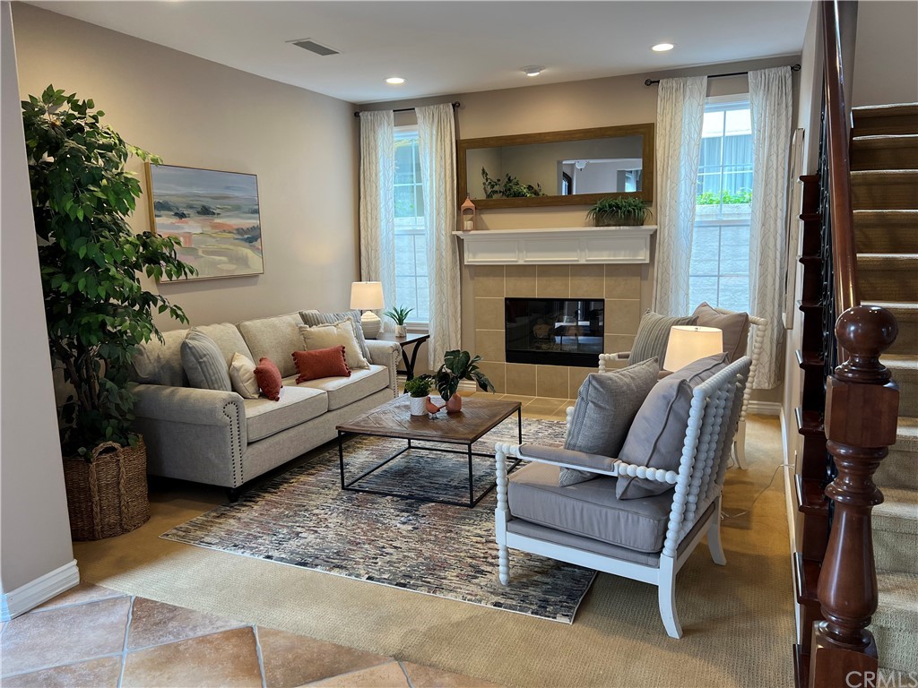 517 Via El Risco San Clemente, CA 92673 - Photo 9 of 51 a living room with furniture and a fireplace