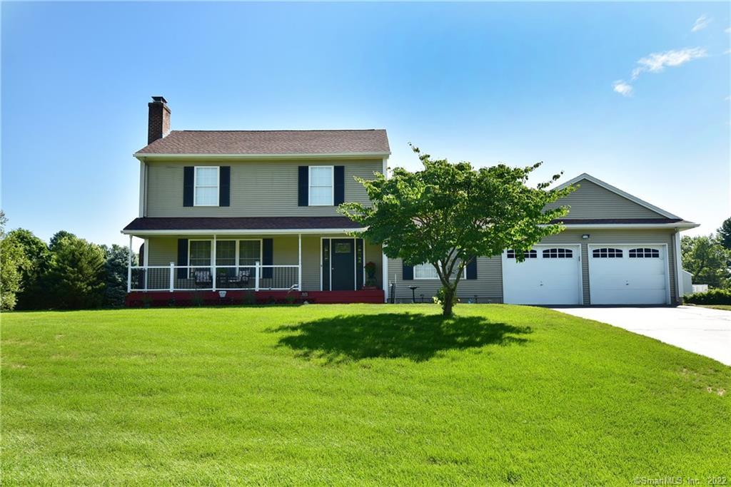 68 Broadleaf Circle Suffield, CT 06093 - Photo 1 of 1 a front view of a house with a yard