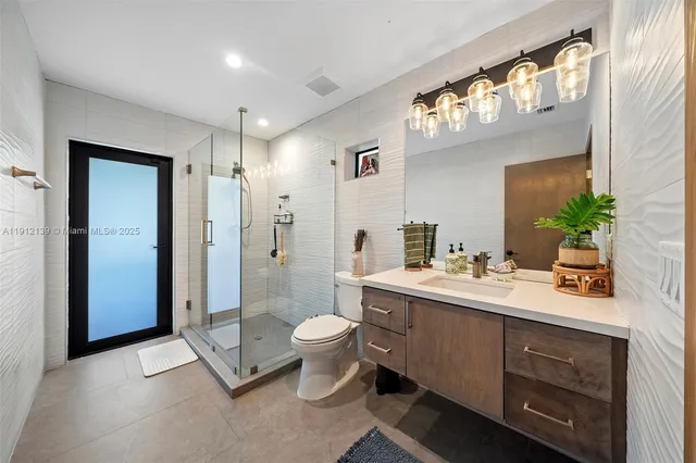 a view of a lake with a house in the background