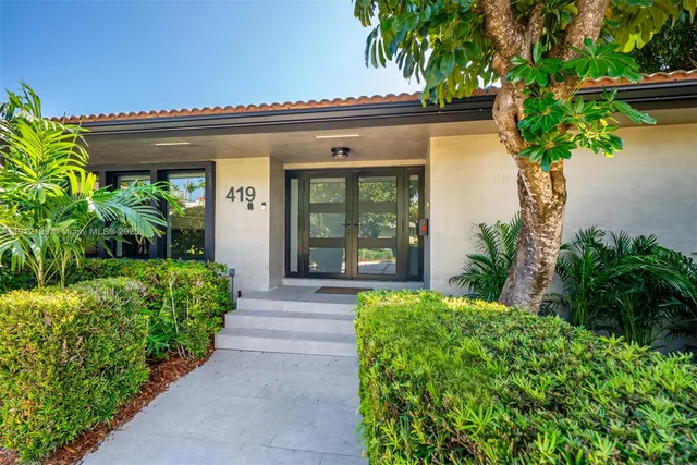 view of a house with a backyard space