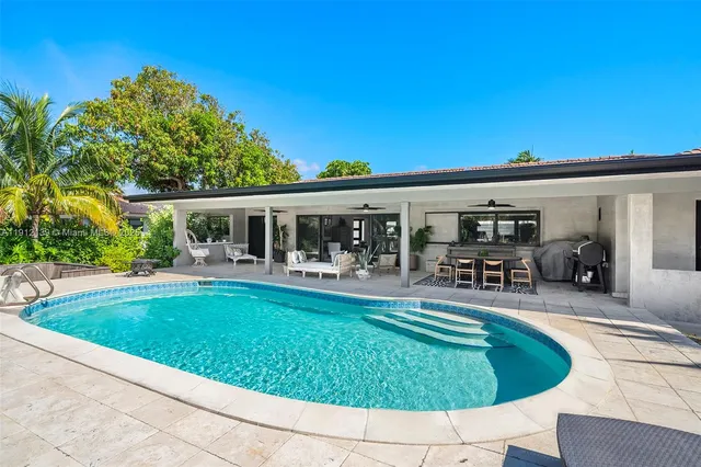 a outdoor living space with furniture and garden view