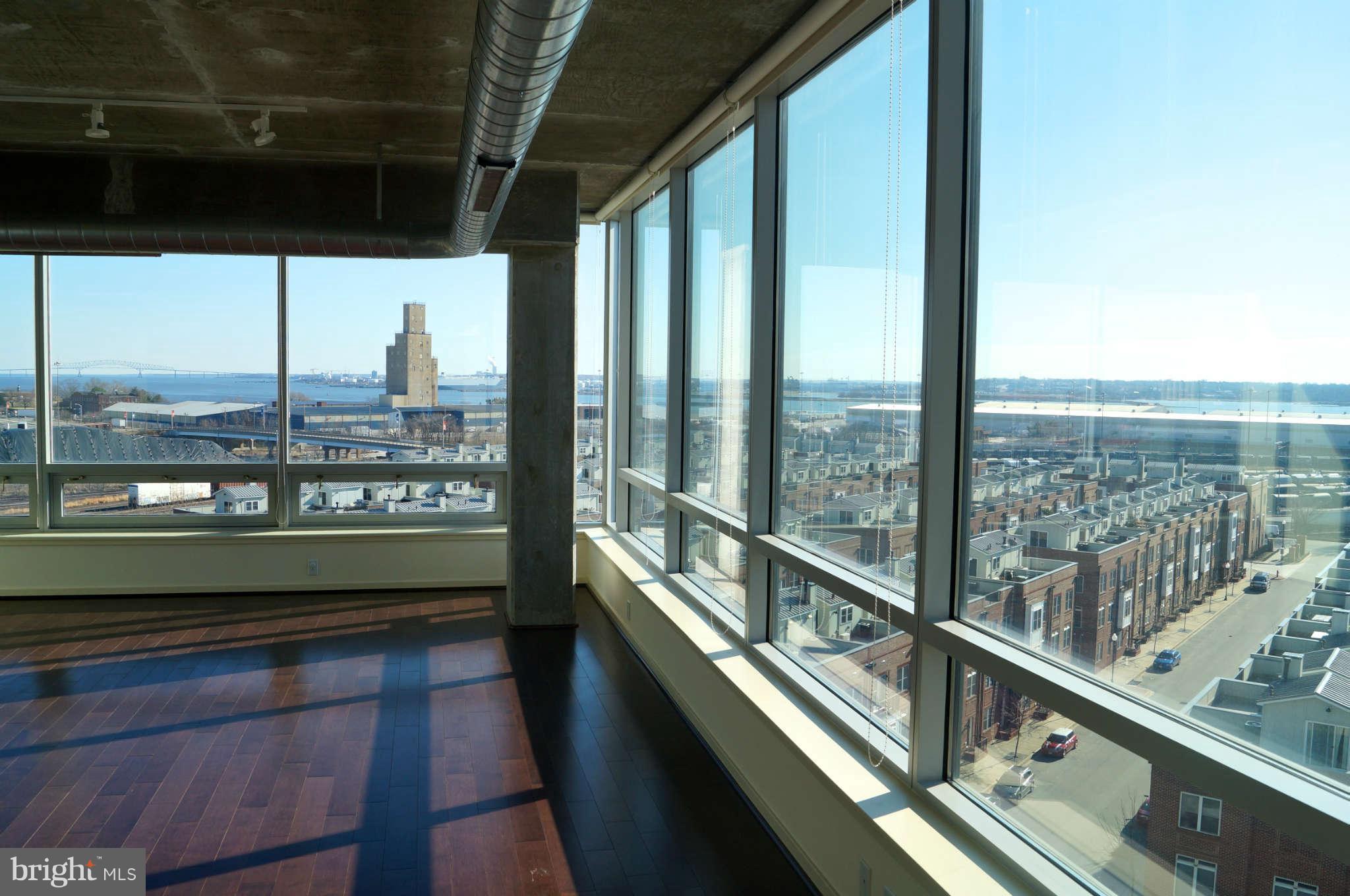1200 Steuart Street, Unit 822 Baltimore, MD 21230 - Photo 2 of 30 a view of a building from a balcony