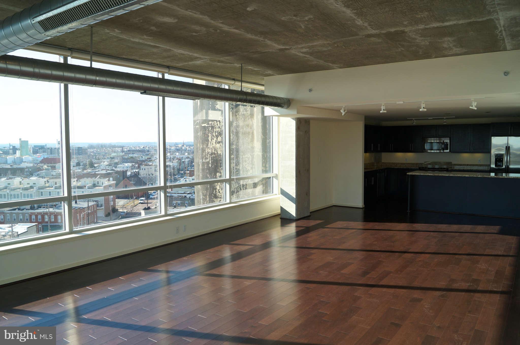 1200 Steuart Street, Unit 822 Baltimore, MD 21230 - Photo 14 of 30 a lobby with a large window
