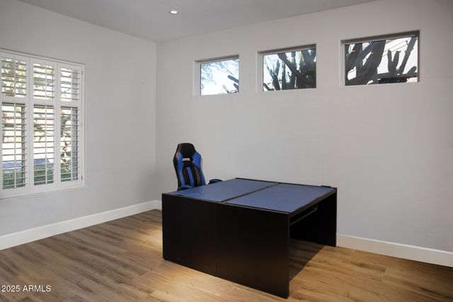 a room with a bed and a window