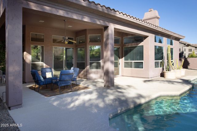 a view of a building with sitting area