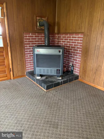 a living room with a fireplace