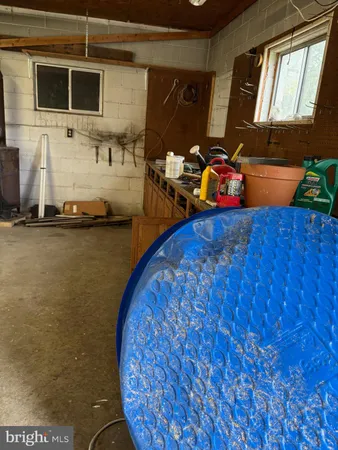 a living room with fireplace furniture and a flat screen tv