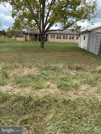 a house with yard in front of it