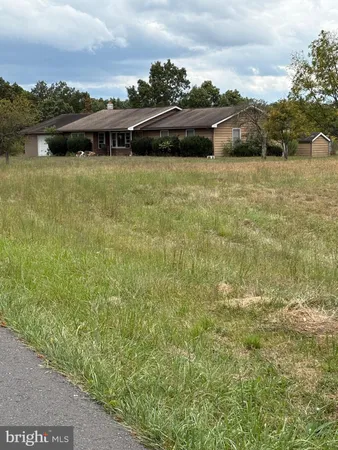 a view of a lake with a big yard