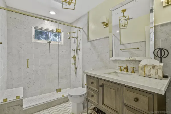 a view of a chair and table in the backyard