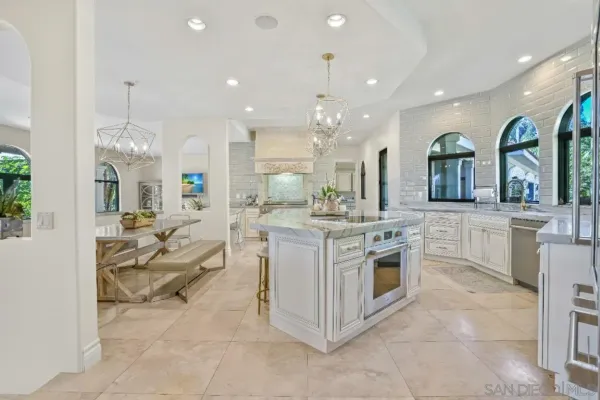 a kitchen with counter top space and appliances