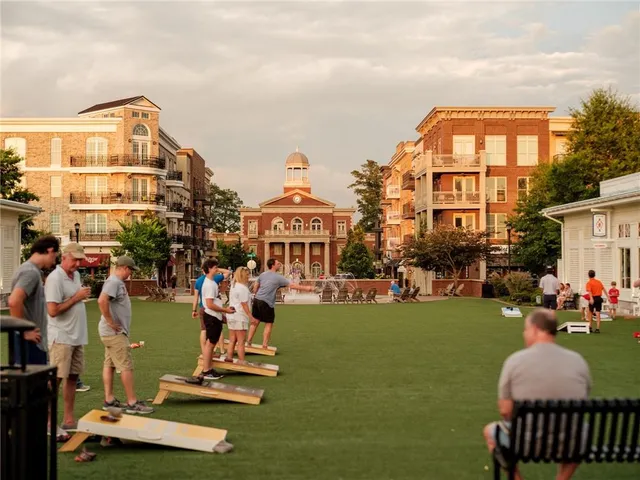 a view of a house with backyard gym equipment