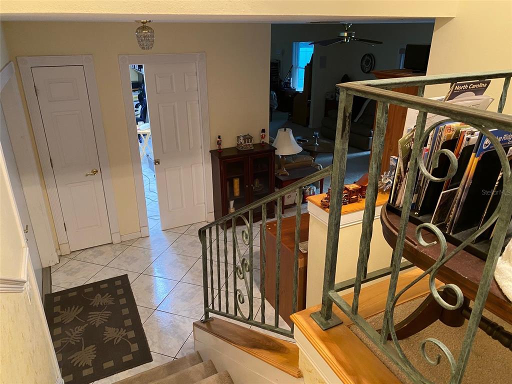 626 Orchid Lane Altamonte Springs, FL 32714 - Photo 18 of 24 a view of an entryway with wooden floor