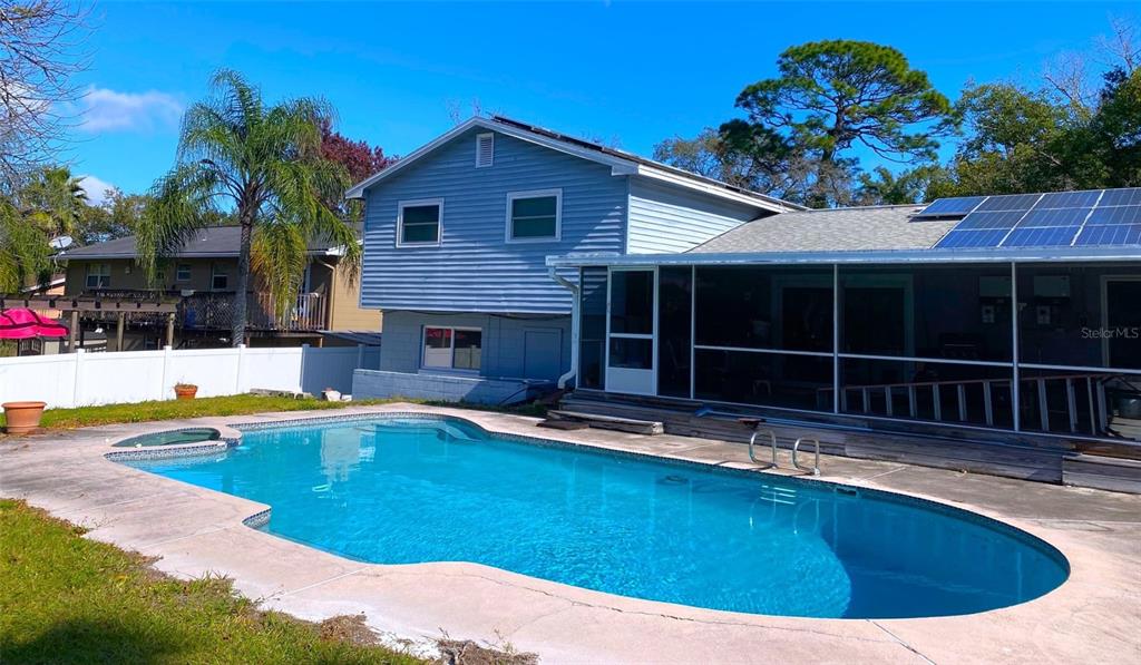 626 Orchid Lane Altamonte Springs, FL 32714 - Photo 2 of 24 a view of a house with swimming pool