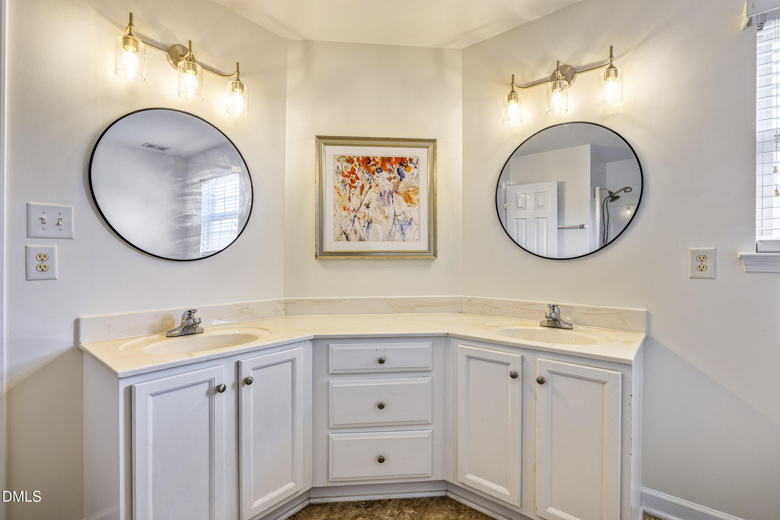 2208 Water Spray Drive Raleigh, NC 27610 - Photo 19 of 28 a bathroom with a toilet a sink and a mirror