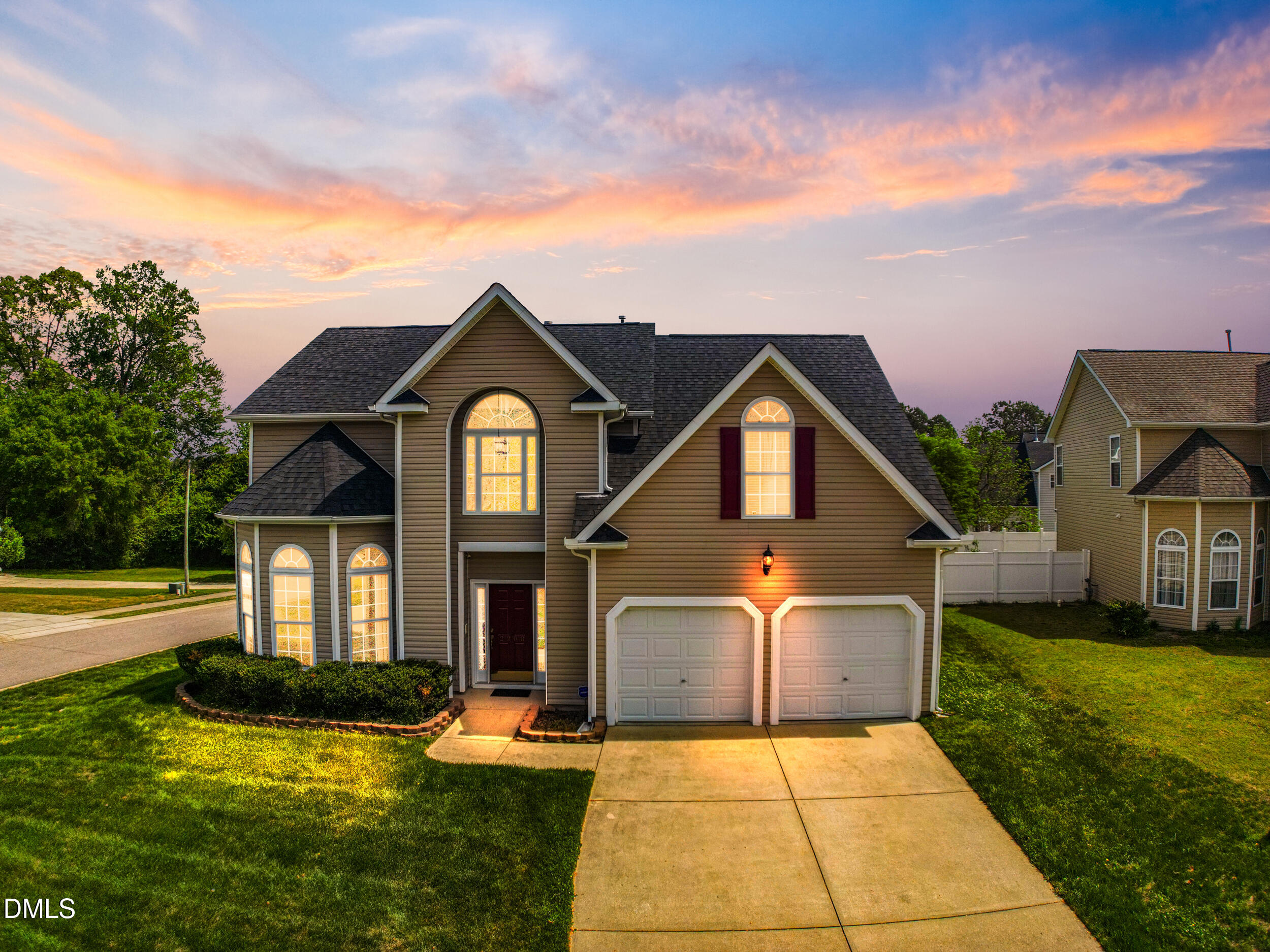 2208 Water Spray Drive Raleigh, NC 27610 - Photo 28 of 28 a front view of a house with yard and green space