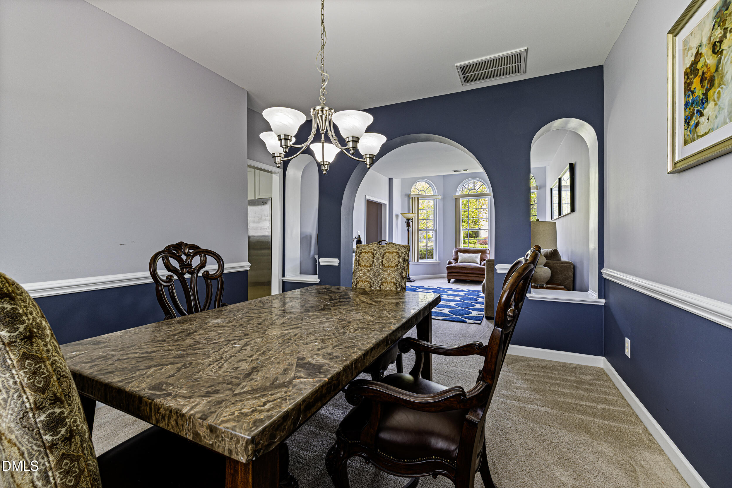 2208 Water Spray Drive Raleigh, NC 27610 - Photo 6 of 28 a view of a dining room with furniture