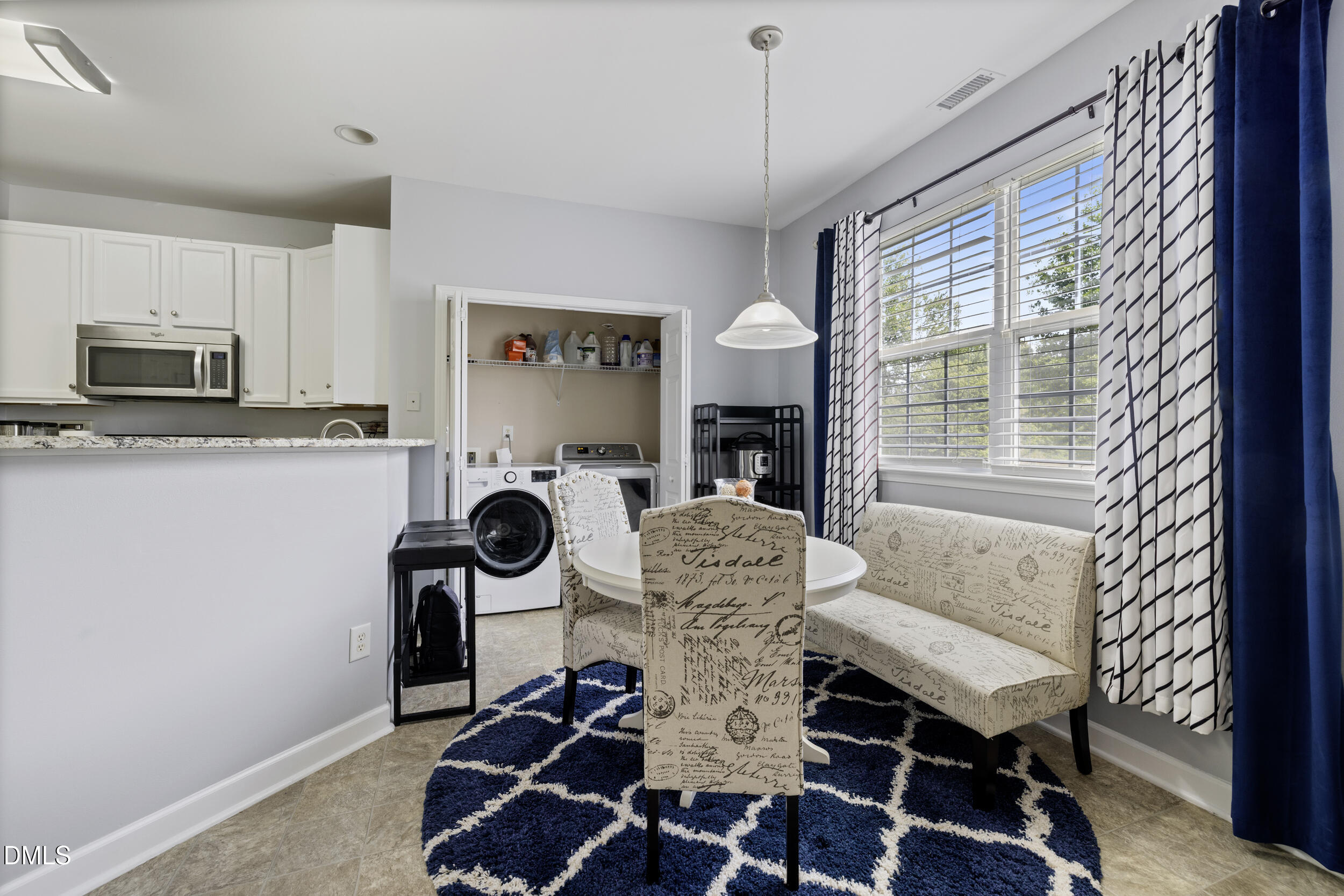 2208 Water Spray Drive Raleigh, NC 27610 - Photo 10 of 28 a dining room with furniture and window