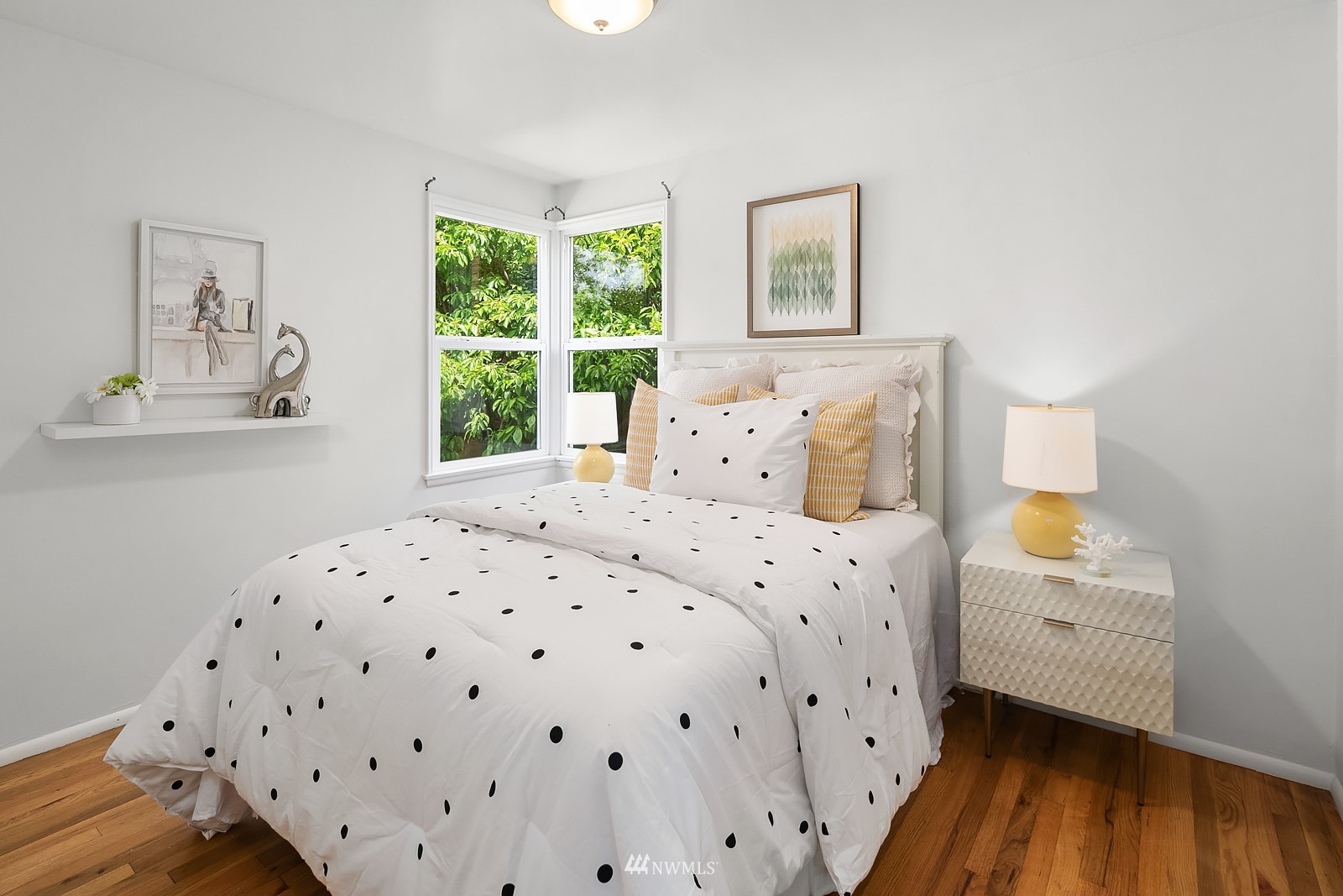 336 Northwest 47th Street Seattle, WA 98107 - Photo 12 of 36 a bedroom with a bed and a window