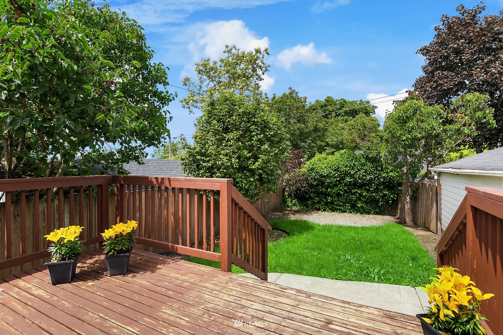 336 Northwest 47th Street Seattle, WA 98107 - Photo 28 of 36 a view of a deck with furniture and garden